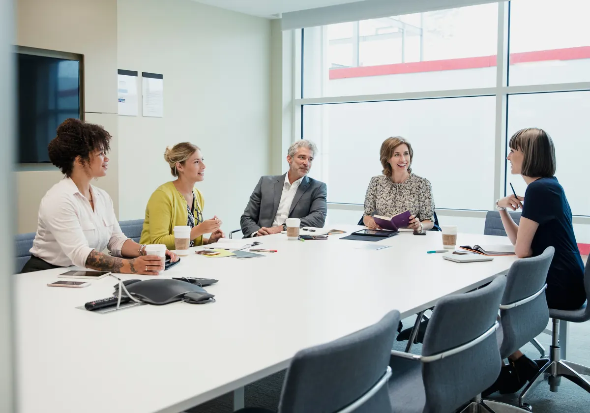 Directors in a confidential consultation with a Verasi advisor